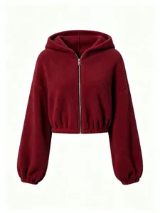 Burgundy sherpa zip-up hoodie detail, showing soft fleece texture and elastic hem and cuffs.