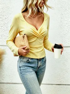 Elegant solid color cross V-neck long sleeve top for women, chic autumn fashion style.