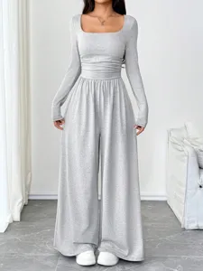 Grey square neck long sleeve wide leg jumpsuit detail showcase, presenting trendy casual style.