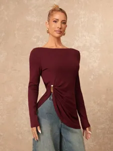 Elegant burgundy long sleeve top featuring an asymmetrical metal buckle and chic side slit design.