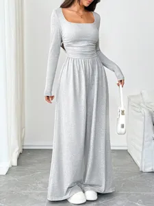 Casual solid square neck long sleeve wide leg jumpsuit for women, stylish autumn fashion outfit.