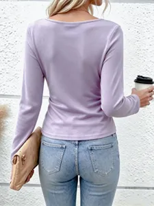 Detailed view of the elegant solid color long sleeve top from the back, worn with jeans.