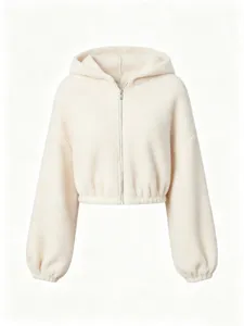 Detail view of a cozy beige sherpa zip-up hoodie featuring soft fleece texture and metal zipper.
