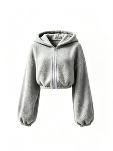 Close-up detail showing soft sherpa fleece texture, smooth metallic zipper and elastic cuffs.