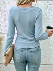 Back view detail of the elegant solid color long-sleeve women top, chic autumn daily wear.