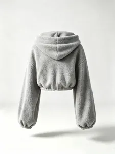 Grey sherpa fleece fabric detail, soft texture and cozy hood design for winter wear.