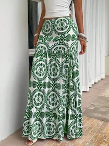 Detail view of women bohemian green floral print maxi skirt, elegant summer beach long skirt.