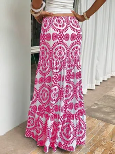 Detailed view of bohemian print long skirt, stylish summer beach resort wear for women.