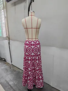 Detailed back view of women bohemian printed long maxi skirt summer beach tiered skirt.