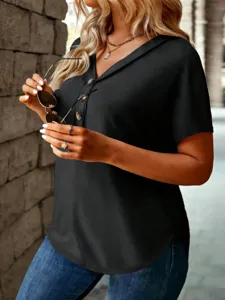Casual black V-neck short sleeve top detail showing soft fabric and front buttons.