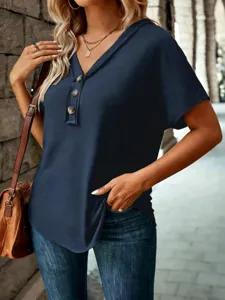 Detailed view of the stylish V-neck short sleeve casual top, showcasing buttons and fabric.