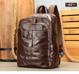 Dark brown genuine leather backpack detail shot, men business casual vintage rucksack.