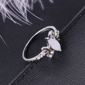 Silver color women ring featuring white marquise opal moonstone and sparkling cubic zirconia.
