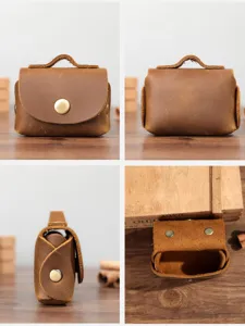 Mini étui pour écouteurs et porte-monnaie en cuir véritable vintage avec bouton-pression.