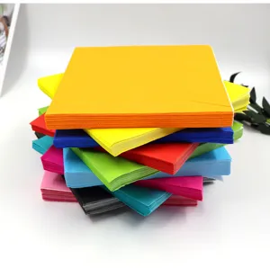Close-up view of a colorful stack of disposable paper napkins in vibrant assorted party shades.