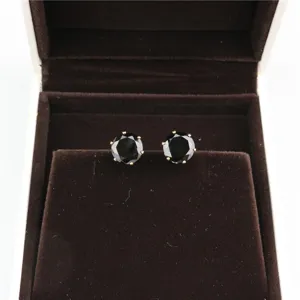 Round black zirconia stud earrings detail view, 8mm minimalist style fashion jewelry.