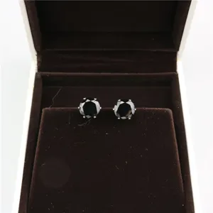 Round black zircon stud earrings in elegant jewelry box, simple style fashion accessories.