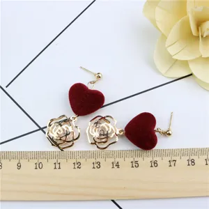 Gold-plated earrings with red velvet hearts and hollow metal roses for sweet daily wear.