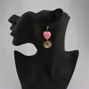 Sweet velvet heart and hollow rose zircon drop earrings detail, elegant gold tone design.