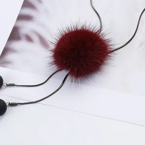 Wine red mink fur pom pom long sweater chain necklace, elegant winter fashion jewelry.