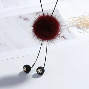 Long winter sweater chain featuring a fluffy burgundy mink fur ball and delicate beaded tassel.