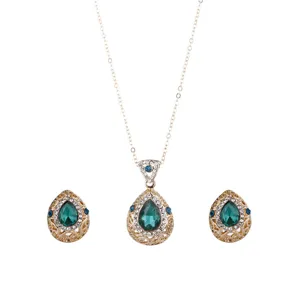 Detailed shot of exquisite teardrop crystal necklace and matching earrings jewelry set sparkle.