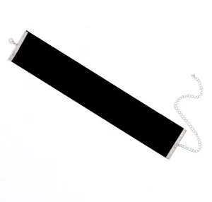 Detailed view of the wide black velvet choker necklace, highlighting silver metal ends.