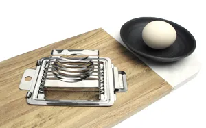 Stainless steel egg slicer kitchen tool detail view, perfect for cutting boiled eggs easily.