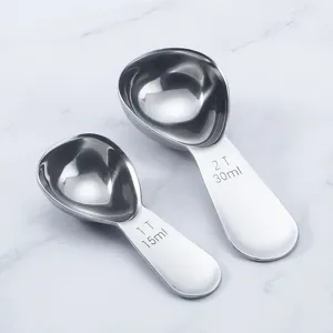 Stainless steel measuring spoon set, 15ml and 30ml coffee scoops with engraved capacity scale.