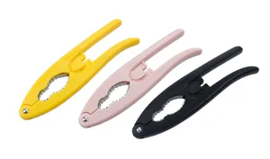 Multi-purpose nutcracker pliers set with metal serrated jaws and colorful handles for kitchen.