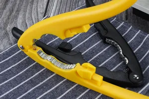 Detailed view of heavy duty zinc alloy nut cracker, ergonomic kitchen tool for cracking nuts.