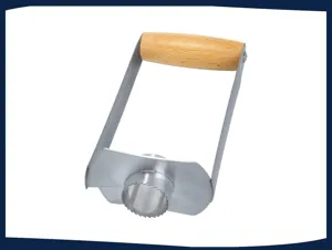 Stainless steel pineapple corer detail view, wooden handle and sharp serrated blade for fruit.