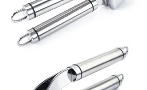 Stainless steel garlic press handle detail showcasing premium metal texture and hanging loop.