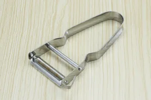 Stainless steel fruit vegetable peeler kitchen tool with dual blade design for kitchen use.