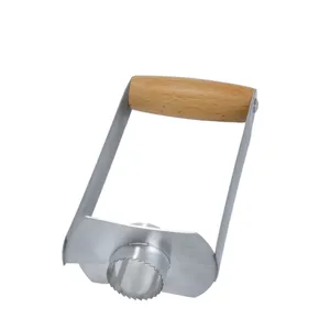 Stainless steel pineapple corer slicer with wooden handle for kitchen fruit tool.