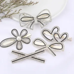 Korean style rhinestone alloy hair clips set, elegant bow and flower duckbill hairpins.