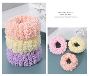 Fluffy plush hair scrunchies for women, soft elastic fuzzy hair ties in pastel colors.