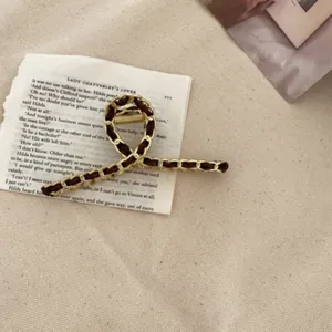 Elegant metal and leather intertwined hair claw clip for women vintage design style