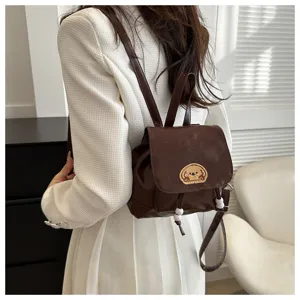 Brown PU leather mini backpack detail, cute dog embroidery and bead drawstring design.