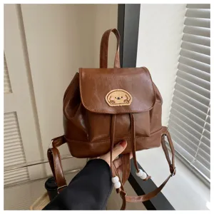 Brown PU leather mini backpack featuring cute dog embroidery, vintage style women school bag
