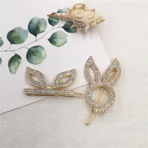 Rhinestone bunny ear hair clips set, gold alloy side hairpins for women and girls daily wear.