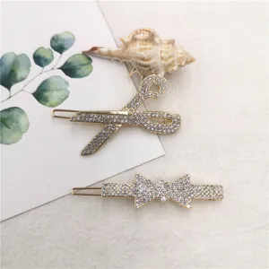 Exquisite rhinestone hair clips featuring cute scissor and bow designs for stylish daily wear.