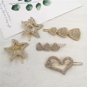 Gold rhinestone hair clips set, sparkling star and heart hairpins for women and girls daily wear.