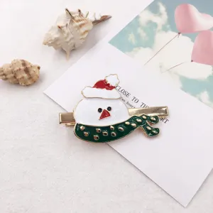 Cute Christmas snowman hair clip with red hat and green scarf for women and kids.