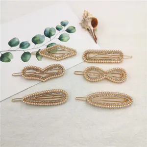 Set of 6 geometric pearl and rhinestone hair clips, elegant gold alloy side clips for girls.