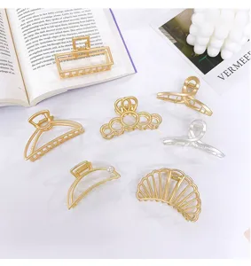 Matte metallic hair claws set, geometric and shell shapes, elegant accessories.