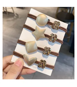 Chic minimalist geometric hair ties set with sparkling crystal beads and durable brown bands.