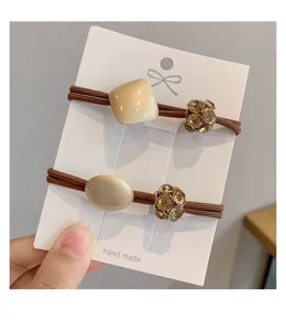 Korean style chic minimalist hair ties set with resin charms and rhinestone balls.