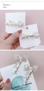 Pearl zircon bow hairpin detail shot, elegant Korean style metal duckbill clip for women.