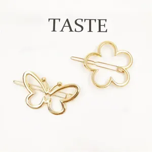 Gold metal hair clip set featuring hollow butterfly and flower designs, stylish and elegant.